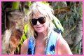 Goldie Hawn Rocks a Red Swimsuit at Age 67, Feeds Dolphins With Kurt Russell